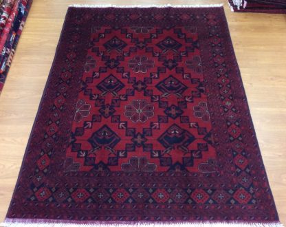 Tribal 1.95  m. X 1.5. m. fine wool red carpet