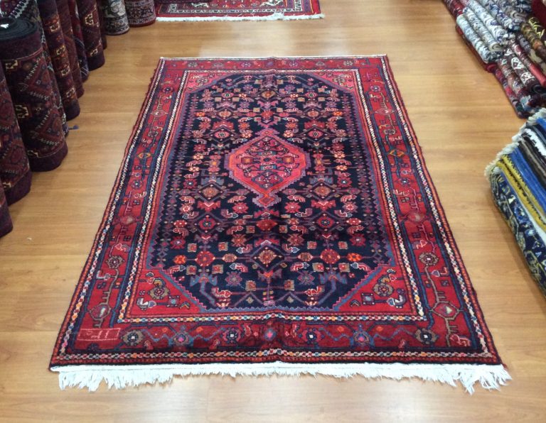 Hamedan 235 cm. X 140 cm. fine antique wool rug