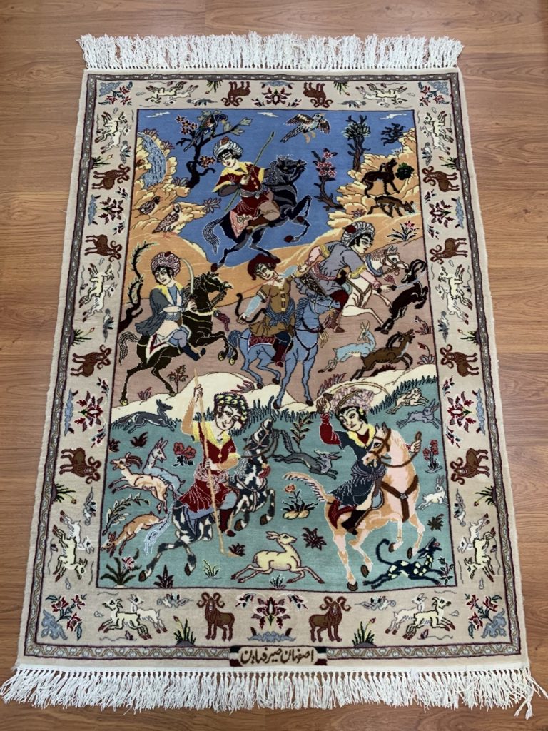 Extra fine Isfahan silk and wool hunting scene rug