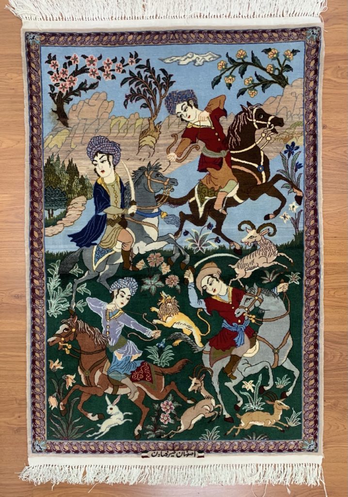 Extra fine Isfahan silk and wool hunting scene rug