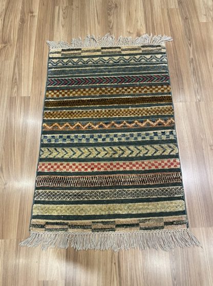Persian tribal wool small rug 87cm. X59 cm.