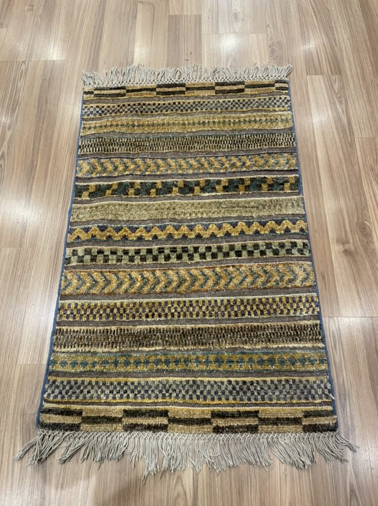 Tribal wool small rug 86 cm. X 55 cm.