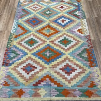 Bohemian handwoven wool kilim rug size 217 cm. X 147 cm.